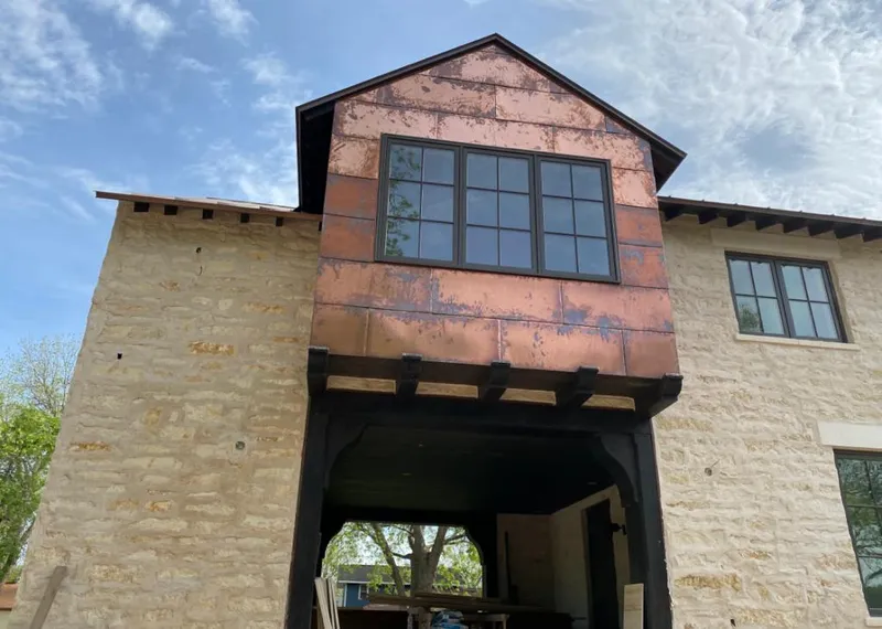 Copper metal panel facade on a stone building for Metal Roof Coating in Temple City